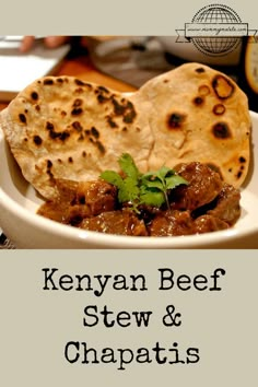 a white bowl filled with meat and pita bread