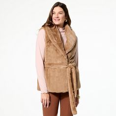 TWRHLL by Christie Brinkley Belted Faux Fur Vest This sleeveless faux fur vest with a belted waist gives you just the right amount of winter warmth. Layer it over any of your cold weather wardrobe staples for stylish outfits that become your signature "wow" looks. Christie Brinkley, Faux Fur Vest, Faux Fur Vests, Fur Fashion, Draped Fabric, Fur Vest, Unique Fashion, Outerwear Jackets, Wardrobe Staples