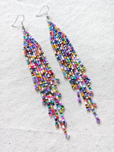 beaded fringe Earrings made with a purple tonedbead soup. Finished with a hypoallergenic nickel free hook. They hang approximately 6" long. *All of my materials used for my pieces are purchased from other local small indigenous businesses. it's very important to me to keep what I make local and in support of other small businesses and my indigenous communities.** If you love your items once received, I'd appreciate so much if you could leave a review in my shop! :-) This is tremendously helpful Indigenous Beadwork, Long Beaded Earrings, Beaded Fringe Earrings, Native American Beaded Earrings, Earrings Purple, Native American Beading, Beaded Fringe, Fringe Earrings, Love Your