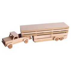 a wooden toy truck with a trailer on the back