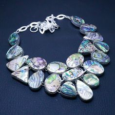 ------------------------------------------ Welcome to Our Sunrisejewelshub ------------------------------------------ Elegant Abalone Shell Gemstone Handmade Necklace, Choker Adjustable Necklace, 925 Sterling Silver Jewelry, Birthday Gift, Necklace For Love SKU:- AB-9335 Metal:- Sterling Silver Metal Purity:- 925 Gemstone:- Abalone Shell Gemstone Creation:- Natural Note We are continuously adding new products in our store. So keep coming back to see more great deals on jewelry in our Store. Amaz Sterling Silver Teardrop Necklace For Birthday, Sterling Silver Teardrop Birthday Necklaces, Sterling Silver Teardrop Necklace For Birthdays, Silver Teardrop Necklace With Jewels, Silver Teardrop Jeweled Necklace, Unique Teardrop Necklace For Anniversary, Silver Jeweled Necklace For Anniversary, Sterling Silver Necklaces With Natural Stones For Anniversary, Silver Gemstone Necklace For Birthday