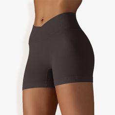 The Anna-Kaci Women's High Waist Seamless Ribbed Biker Shorts are a stylish and functional addition to your activewear collection. Made from soft, stretchy ribbed fabric, these biker shorts feature a high waist design that provides excellent support and a flattering fit. The seamless construction ensures maximum comfort and freedom of movement, making them perfect for workouts, yoga sessions, or casual wear. Pair these versatile shorts with a crop top, sports bra, or oversized tee for a chic and Seamless Athletic Shorts For Sports, High Stretch Seamless Yoga Shorts, Seamless Solid Bottoms For Sports, Solid High Stretch Seamless Shapewear, Seamless Yoga Bottoms, High Stretch Solid Shapewear With Seamless Construction, Solid Color High Stretch Seamless Shapewear, Solid Shapewear With Seamless Construction And High Stretch, High Stretch Seamless Shorts