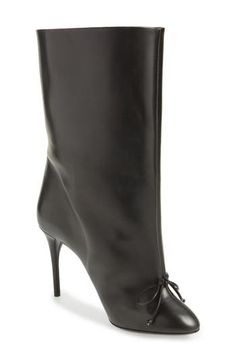 The widened, slouchy shaft sweeping the 2024 runways is highlighted in this Italian-leather boot framed by a towering stiletto and a dainty bow. 3 1/2" (90mm) heel (size 39) 9" shaft Pull-on style Leather upper and lining/rubber sole Made in Italy Designer Shoes Luxury Leather Lace-up Boots With Pointed Toe, Luxury Leather Heeled Boots With Lace-up Fastening, Alaia Boots, Alaia Leather Jacket, Alaia Runway 2024, Italian Leather Boots, Leather Boots Women, Leather Boot, Fabric Gift Bags