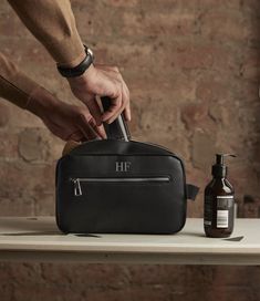 Introducing our Personalised Toiletry Wash Bag - a stylish and practical accessory that adds a touch of individuality to your grooming routine. This initials bag with a monogram is not just a toiletry bag; it's a personalised statement that makes it the perfect gift for groomsmen, a thoughtful Father's Day present, or a versatile cosmetic and makeup bag for everyday use. Crafted with precision and care, this toiletry bag boasts a sleek and compact design, perfect for organizing your grooming ess Functional Bags With Zipper Pocket For Gifts, Modern Bag With Zipper Pocket For Gift, Modern Bag With Zipper Pocket As Gift, Personalized Toiletry Bag, Gift For Groomsmen, Personalized Cosmetic Bags, Vegan Bag, Personalized Gifts For Men, Fathers Day Presents