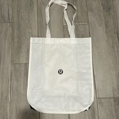 Large White Lululemon Tote Bag. Brand New. Casual White Bag For Gym, Casual White Gym Bag, Everyday White Packable Bag, White Sports Tote Bag, White Tote Gym Bag, White Lightweight Bags For Everyday Use, White Lightweight Shoulder Bag For Everyday Use, White Packable Tote Bag, White Packable Bags For Daily Use