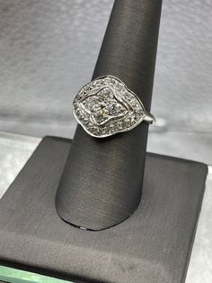 A stunning ladies antique 14 karat solid white gold 2.50 carat diamond dome cocktail ring.  A gorgeous antique ring that's truly one of a kind!   Dripping with sparkle!  This fabulous women's antique diamond ring is very special and in need of a special woman to love it. Weight:  5.1 grams Total Diamond Weight: 2.50 carats Size:  9 Our Price $3695.00 Regularly Priced At $4800.00 Please See Our Video Remember - If you're purchasing for yourself or a gift for a loved one, buy with confidence.  We Collectible Diamond Ring With Brilliant Cut, Brilliant Cut Diamond Ring For Collectors, White Gold Crystal Ring With Single Cut Diamonds, Elegant Collectible Jewelry With Single Cut Diamonds, Fine Jewelry Crystal Ring With Diamond Accents, Collectible Platinum Diamond Ring In Diamond White, White Diamond Dome Ring For Anniversary, Collectible Diamond White Platinum Diamond Ring, Elegant Diamond Dome Ring With Diamond Cut