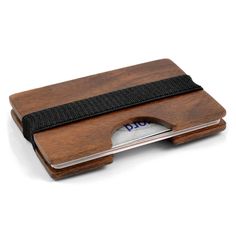 a wooden business card holder with a black ribbon around it's edge and an id slot in the middle