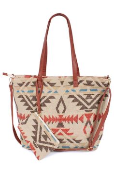 FINAL SALE This Aztec Tote Bag is the ideal travel companion with its spacious size of 19" X 13.5" and detachable pouch size of 7.5" X 5.5". Perfect for an overnight trip, it offers convenience and versatility for your on-the-go lifestyle. Keep your essentials organized and easily accessible with this stylish and functional bag. Aztec Bag, Fringe Clutch, Boho Tote, Southwestern Print, Card Purse, Bags Handmade, Leather Bags Handmade, Weekender Tote, Black Tote Bag