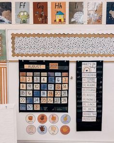 a bulletin board with calendars and numbers on it