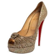 How gorgeous are these pumps from Christian Louboutin! They've been beautifully covered in glitter fabric and styled in a gathered knot on the uppers. These pumps carry peep-toes, platforms with 14.5 cm heels, and the signature red soles. Let this pair lift your outfits by owning them today. Italian Heels, Platform Pumps Heels, Shoes Heels Classy, Gold Pumps, Christian Louboutin Heels, Cute Heels, Purple Suede, Glitter Fabric, Peep Toe Heels