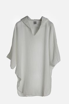 Our most beloved piece for summer. This one piece, super soft, cuddly poncho is perfect for the beach or at home over our Koza Pants. The cocoon like texture warms you up immediately. Easy to fold and take anywhere as it would not have wrinkles. Water absorbent and dries quickly. Oversized White Cover-up For Loungewear, Relaxed Fit Summer Loungewear Cover-up, Oversized Beachwear Cover-up For Loungewear, Summer Relaxed Fit Cover-up For Loungewear, Oversized Casual Poncho For Vacation, Summer Relaxed Fit Lounge Cover-up, Oversized Beach Poncho For Spring, Oversized Poncho For Beach In Spring, Spring Loungewear Poncho With Batwing Sleeves