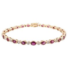 This Diamond and 4.9 Carat Faceted Ruby Tennis Bracelet in 18K gold showcases 4.9 carats endlessly sparkling natural ruby and 0.61 carats of diamonds. It measures 7 inches long in length. Ruby improves mental strength. Designed with perfect oval cut ruby alternatively set with diamonds to make you stand out on any occasion or event. The elegant style complements the attire beautifully and is a perfect july birthstone bracelet, Engagement Gift, Bridal Shower Gift, Gift For Love, Gift For Sister, Gift For Love, Mother Daughter Gifts, Birthstone Bracelet, Mental Strength, Gift For Sister, Bridal Shower Gift, Birthstone Bracelets, July Birthstone, Tennis Bracelet Diamond