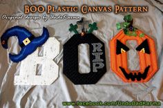 three halloween decorations made out of plastic canvass on top of a white sheet with the words boo plastic canvass pattern