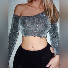 New Never Worn Shein Icon Asymmetrical Silver Neck Lettuce Trim Glitter Crop With Sleeves Top Large Shoulder 15.4/Length 16.7/Sleeve Length 25.6/Bust 35/Cuff 8.1/Bicep Length 12.4 67% Polyester Metalized Fibres 33% Chic Long Sleeve Glitter Tops, Chic Shiny Summer Tops, Chic Shiny Tops For Party Season, Chic Long Sleeve Crop Top For Party, Shiny Summer Tops For Night Out, Trendy Off-shoulder Crop Top For Parties, Stretch One-shoulder Crop Top For Party, Off-shoulder Tops For Evening Party Season, Spring Party Tops With Shine Detail