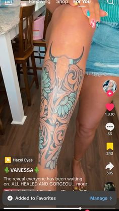 a woman with tattoos on her leg and arm