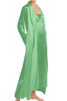 This mint green wrap dress is made of lustrous cupro silk and features an solid green, wrap maxi dress green, floor length wrap dress, at Kyle X Shahida. Wear it loose or cinch the belted waist to define your figure.Details: 100% Cupro Silk Long Sleeve Wrap Dress Shawl collar; wrap front Self-tie sash at waist Long Wrap Dress Relaxed Silhouette. Hem Falls Below Knees Mint Color Imported Dry Clean Gentle hand wash only Green Draped Silk Maxi Dress, Chic Green Belted Maxi Dress, Spring Silk Wrap Maxi Dress, Silk Wrap Maxi Dress For Spring, Green Maxi Dress With Tie Waist For Party, Spring Silk Maxi Dress In Solid Color, Silk Maxi Dress In Solid Color, Dress Shawl, Green Wrap Dress