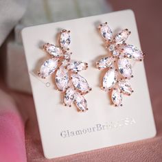 "Very romantic crystal bridal stud earrings. Gorgeous crystal wedding earrings for bride or bridesmaids. Matching necklace and bracelet will complete your bridal jewelry set. This wedding jewelry set is available in silver, gold or pink gold(rose gold) color to match your dress. They measure about 1 1/4\" long and 1/2\" wide. Matching regular bracelet is measuring: 7\" long and 1/4\" wide or adjustable bracelet option is available as well to fit a larger or smaller wrist. High quality guaranteed Rose Gold Cubic Zirconia Earrings For Wedding, Rose Gold Cubic Zirconia Wedding Earrings, Glamorous Rose Gold Cubic Zirconia Bridal Earrings, Rose Gold Sparkling Stones Bridal Earrings For Anniversary, Rose Gold Bridal Earrings With Sparkling Stones For Anniversary, Glamorous Rose Gold Wedding Jewelry, Glamorous Rose Gold Jewelry For Wedding, Rose Gold Cubic Zirconia Jewelry For Wedding, Rose Gold Wedding Jewelry With Sparkling Stones