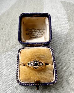 Beautiful antique Edwardian ring, 18 ct gold ornate carved head and scrolling shoulders, set with three graduated round cut sapphires spaced by two rose cut diamonds, Birmingham hallmarks 1918. UK Ring size O, ring in good condition comes with antique presentation box. Antique Yellow Gold Sapphire Ring With Rose Cut Diamonds, Antique Three Stone Diamond Ring For Formal Occasions, Antique Oval Sapphire Ring With Single Cut Diamonds, Antique Three Stone Diamond Ring, Antique Oval Sapphire Ring With Rose Cut Diamonds, Victorian Yellow Gold Sapphire Ring, Victorian Sapphire Ring With Diamond For Formal Occasions, Vintage Three Stone Sapphire Ring, Vintage Sapphire Three Stone Ring For Formal Events