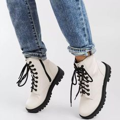 The Time Is Here To Show Off Your Style Game In These Off White Combat Boots. This Ankle Boot Silhouette Features Smooth And Sleek Faux Leather That Shapes A Rounded Toe And A Lace-Up Upper (With Matching Hardware) Atop A Thick Platform Lug Sole. A Back Pull Tab Completes This Edgy Yet Trendy Look! ** Bundle Up To Get An Additional 10% Discount ** Condition: Brand New Color: Off White Heel Height: 1.5" (Approximately) Fits: True To Size (M) White Martin Boots For Spring, Casual White High-top Martin Boots, Trendy High-top White Martin Boots, Trendy White Martin Boots With Round Toe, White Martin Boots With Round Toe For Spring, Trendy White High-top Martin Boots, Spring High-top Lace-up Boots With Padded Ankle, Trendy High Ankle Martin Boots In White, Trendy White High Ankle Martin Boots