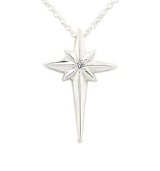 "The faceted design of this beautiful necklace reminds us of bright star in the sky that was a sign of Christs birth. This pendant, set with a .02 ct diamond in the center, reminds us of this sign from heaven. Sterling Silver, 7/8\" tall. Hangs on an 18\" Sterling Silver cable chain with lobster clasp. Handmade in the US." Silver Star-shaped Diamond Necklace, Silver Diamond Star Necklace, Star-shaped Brilliant Cut Necklace, Star-shaped Brilliant Cut Necklace For Gift, Formal Star-shaped Single Diamond Jewelry, Sterling Silver Star-shaped Diamond Necklace, Sterling Silver Star Diamond Necklace With Accents, Dazzling Star-shaped Necklace For Anniversary, Formal Starburst Diamond Jewelry