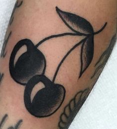 a close up of a person's arm with a tattoo on it, and an olive branch