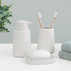 The Modern Matte White Ceramic Bath Accessories | Crane & Canopy White Toothbrush Holder, Romantic Bedding, Hospital Gifts, Chic Bedding, Ceramic Color, Bathroom Storage Organization, Bathroom Items, Soap Pump, Ceramic Set