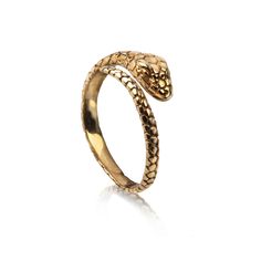 Beautiful Adjustable Snake ring in gold vermeil. The snake is the symbol of transformation and creation.  The detailed snake can be worn in any finger to match your look.  The ring comes packed in a box. Please avoid contact with chemicals. It is a 18k gold surface plating on sterling silver. It will fade over time and please do not use any silver cleaner. Elegant Gold Brass Snake Ring, Elegant Gold Snake Ring In Brass, Adjustable Gold Snake Ring, Yellow Gold Snake-shaped 14k Gold Rings, Adjustable Gold Snake Ring Symbolic, Adjustable Symbolic Snake Ring, Adjustable Gold Symbolic Snake Ring, Adjustable Snake Ring In Yellow Gold, Gold Luxury Snake Ring For Promise