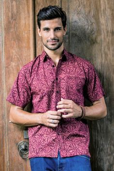 Shades of burgundy and salmon form a geometric pattern on this men's shirt from Indonesia. By artisan Agus Suryanto the cotton shirt features short sleeves and a button-down front. Casual Short Sleeve Batik Print Shirt, Short Sleeve Burgundy Tops For Summer, Burgundy Short Sleeve Tops For Summer, Short Sleeve Cotton Tops With Batik Print, Cotton Batik Print Short Sleeve Tops, Relaxed Fit Short Sleeve Batik Print Top, Relaxed Fit Short Sleeve Batik Top, Relaxed Fit Short Sleeve Top With Batik Print, Relaxed Fit Batik Print Top With Short Sleeves