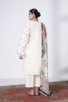 Enliven your look with floral illustrations with this off white cambric embroidered ensemble paired with a tissue dupatta. Product DetailUnstitched 2-Piece SHIRTDyed Embroidered Dobby Shirt Front Panels 3PCDyed Dobby Shirt Back 1.15MDyed Embroidered Dobby Sleeves 0.66MDyed Embroidered Organza Border 1PCFabric: OrganzaColour: Off White DUPATTADigital Printed Bemberg Tissue Dupatta 2.5MFabric: Bemberg TissueColour: Multi White Unstitched Suit With Floral Embroidery And Long Sleeves, White Unstitched Lawn Suit With Printed Motifs, White Cambric Unstitched Suit With Printed Motifs, White Cotton Unstitched Suit With Floral Embroidery, Semi-stitched White Salwar Kameez With Printed Motifs, White Unstitched Suit With Resham Embroidery For Spring, Elegant White Salwar Kameez With Printed Motifs, Unstitched Off White Lawn Suit With Dupatta, Off White Unstitched Lawn Suit With Dupatta