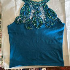 1980’s Ralph Lauren Silk Jersey Halter Top Adorned With Turquoise Nuggets And Glass Beads. Elastic At Back. String Ties. New With Tags. Fitted Blue Beaded Tops, Upcycle Design, Light Pink Tops, Ralph Lauren Black Label, Design Clothes, Hem Top, Sleeveless Sweater, Linen Top, Sheer Sleeves