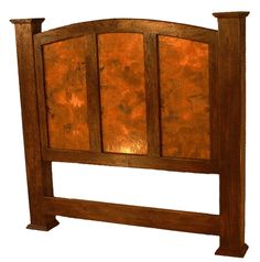 a wooden headboard with three panels on each side and two posts at the top