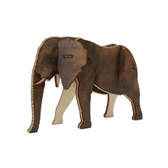 an elephant figurine made out of wood and leather, on a white background