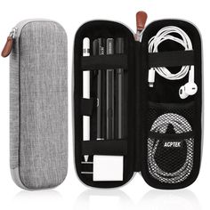 an open case with various items in it and the contents inside are neatly organized, including earbuds