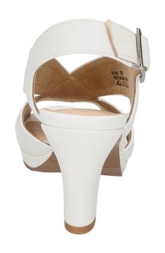 Crossover straps secure your foot in a stylish sandal featuring glittery fabric, a cone-shaped heel and a dainty peep toe. 2 1/4" heel Synthetic upper and lining/rubber sole Imported Open Toe Heels With Removable Insole, Adjustable Open Toe Heels With Padded Heel, Medium Width Open Toe Synthetic Sandals, Strappy Synthetic Heels With Cushioned Footbed, Strappy Heels With Cushioned Footbed, Fitted Synthetic Heels With Heel Strap, Fitted Synthetic Open Heel Heels, Low Heel Synthetic Wedge Sandals With Padded Heel, Fitted Synthetic Slingback Sandals With Ankle Strap