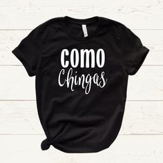 These Como Chingas shirts are the perfect gift for the Latina mom in your life. These shirts are super soft and stylish and printed with high quality heat transfer vinyl in the color of your choice. These shirts are a Unisex jersey fit, so they will be a more relaxed fit. If you wanting a more fitted shirt, please size down. HOW TO ORDER Choose color and size for your shirt Choose color of design for your shirt *We do not recommend a dark shirt color with a dark design color, and vice versa. Sen Black Top With Funny Text For Everyday, Spanish T Shirt Ideas, Cute Spanish Teacher Shirts, Shirts With Spanish Sayings, Funny Spanish Shirts, Spanish T Shirts, Chingona Shirt, Spanish Shirts, Funny T Shirt Sayings