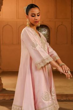 Blush pink short anarkali, adorned with kashmiri tilla, parsi gara embroidery and highlighted with basra moti. Paired with a dogri salwar and embroidered border dupatta. - Aza Fashions Elegant Pink Lehenga With Dabka Detailing, Traditional Drape Pink Palazzo Set With Dabka, Elegant Semi-stitched Pink Churidar, Elegant Pink Semi-stitched Churidar, Elegant Pink Kurta For Eid, Elegant Pink Sharara For Eid, Unstitched Pink Elegant Anarkali Set, Pink Palazzo Set With Dabka For Navratri, Elegant Pink Salwar Kameez For Diwali