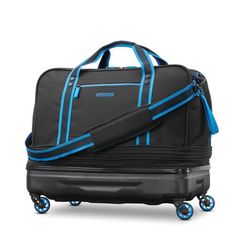 American Tourister's new hybrid duffel design expands when more room is needed. It offers a large packing compartment and built sturdy with in-line wheels, making it easy to maneuver. It has easy interior access zip opening, large main compartment and side pocket compartment for easy access to your essentials while traveling. Size: Expandable Duffel. Color: Black. Travel Duffel Bag Woman, Duffle Bag With Wheels, Black Duffel Bag, Best Travel Luggage, Carryon Luggage, Rolling Duffle Bag, Shopify Marketing, Apartment Stuff, Traditional Jacket