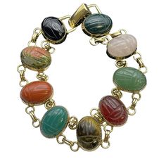 The Vintage Jojak Signed Scarab Bracelet Features Gemstones Carved With Scarab Beetles, Measuring 7 Inches In Length And Designed In The Egyptian Revival Style. It Is A Rare Estate Find That Exudes True Craftsmanship. It's Made Of Sterling Silver. Scarab Jewelry, Scarab Bracelet, Egyptian Revival, Unique Bracelets, Lovely Jewellery, American Jewelry, Women Accessories Jewelry, Estate Jewelry, Sterling Silber