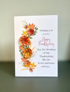 a card with flowers on it that says wishing you very happy thanksgiving