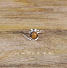 Tiger Eye Ring, 925 Sterling Silver Ring, Women Ring, Minimalist Silver Jewelry, Gemstone Ring, Handmade Ring, Boho Ring, Gift for Sister Gemstone Name - Tiger's Eye  Stone Quality - AAA  Weight - 2.66 gm  Stone Shape - As shown in the picture Ring Size - All Ring Size Available  We serve complete 925 sterling silver Jewelry and genuine properties of the stone.  The products are dispatched from the small business from UK. Product Quality and Packaging - Our all products are 925 Silver Stamped which shows that the product is genuine and authentic .The products are dispatched from the small business from UK so you get the product on time and the product packaging comes in bubble foil wrap with all the precautions taken primarily that your product reaches you with zero damage. Properties of T Minimalist Silver Jewelry, Minimalist Jewelry Silver, Picture Ring, Tiger Eye Ring, Gift For Sister, Tigers Eye Gemstone, Ring Minimalist, Eye Ring, Ring Boho