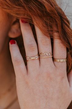 A ring that's as ZANY as you are. 1mm round wire is hand-shaped—each one is unique! Available in 14kt Gold Fill + Sterling Silver. Jess pairs it with our Teeny-Tiny Band, Confetti Ring and Dani Chain Ring. Jess B. styles it with our Cigar Band, Nellie Ring and Supermoon Ring. Our jewelry is handmade so each piece will be unique and may vary slightly from what is pictured. Confetti Ring, Everyday Wear Jewelry, Hoop Charms, Hand Shapes, Ring Size Guide, Jewelry Case, Chain Ring, 14kt Gold, Bridal Earrings