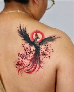 a woman with a tattoo on her back