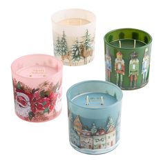 three different colored candles sitting next to each other