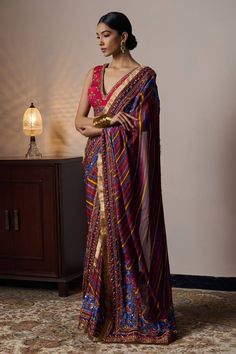 Multicolor saree with floral stripe print all over and hand embroidered with sequin, thread, bead and cutdana work. Paired with embroidered blouse and petticoat. - Aza Fashions Multicolor Cotton Silk Pre-draped Saree With Zari Work, Cotton Silk Pre-draped Saree With Mirror Work For Reception, Festive Multicolor Chanderi Pre-draped Saree, Bollywood Style Multicolor Pre-draped Saree For Navratri, Bollywood Multicolor Pre-draped Saree For Navratri, Cotton Silk Pre-draped Saree With Dupatta For Reception, Festive Multicolor Pre-draped Saree With Unstitched Blouse, Festive Multicolor Unstitched Pre-draped Saree, Multicolor Chanderi Pre-draped Saree With Zari Work