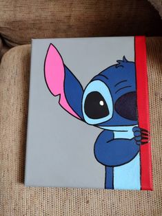 an image of a cartoon character painted on a canvas with red trim around the edges