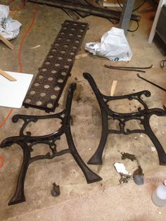 an iron work bench being worked on in a garage