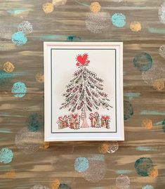 a card with a christmas tree on it