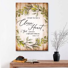 a wooden sign that reads, create in the clean heart and preserve it with leaves