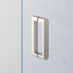 an image of a door handle that is on the side of a glass door with marble background