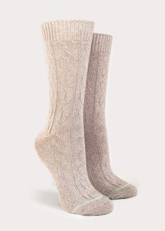 The classic cable-knit women's boot sock made with combed cotton for exceptional comfort and style. A lightweight, breathable construction to spruce up your fall-winter style. Details: Size Guide One size fits most.Recommended Women's US shoe size 6-10, Euro 36 - 41. Materials 90% Cotton, 8% Polyester, 1% Rubber, 1% SpandexMade in China Care Instructions Machine on perm press, no chlorine bleach,hang dry recommended. Fall Cable Knit Knee-high Socks, Comfortable Cable Knit Winter Socks, Comfortable Fitted Cable Knit Socks, Comfortable Beige Mid-calf Socks, Snug Beige Socks For Fall, Casual Beige Socks For Fall, Casual Beige Knee-high Socks, Comfortable Cream Socks For Fall, Comfortable Cream Socks